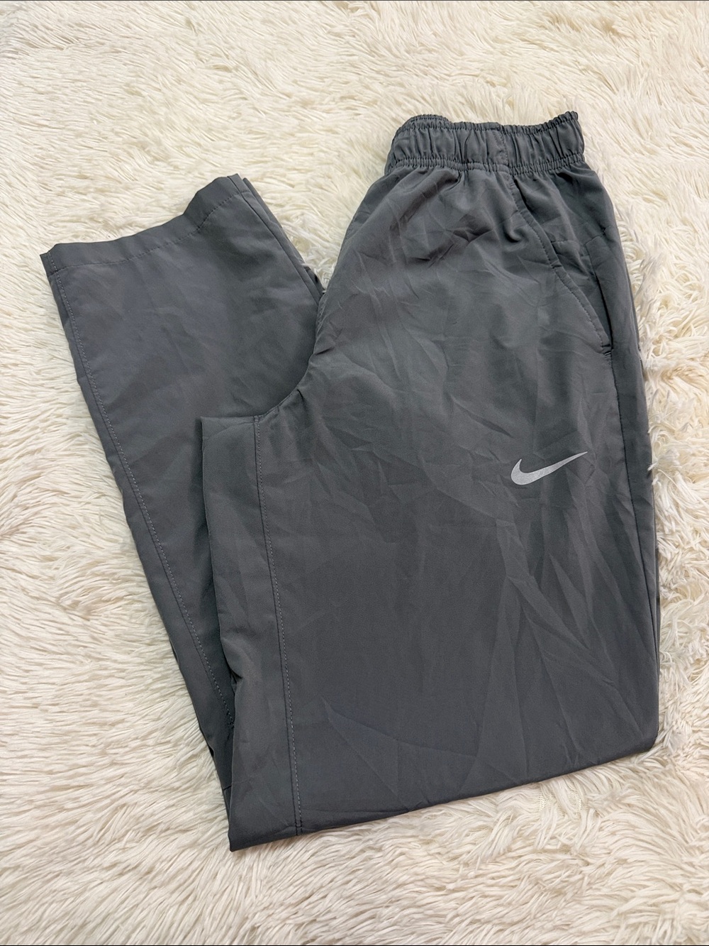 Nike Women's Charcoal Gray Track Joggers with Reflective Swoosh